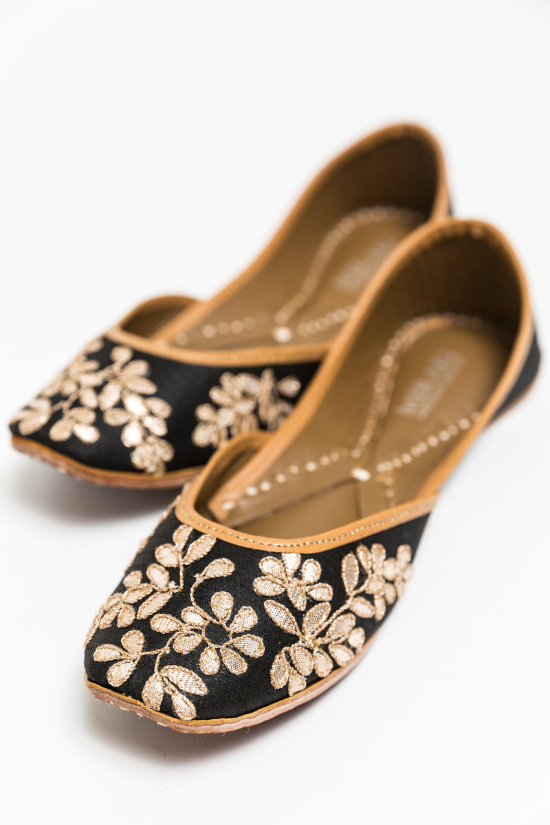 Handcrafted black flats, inspired by South Asian Khussa/Jutti design. Made with 100% genuine leather. Comfortable fancy flats perfect for any occasion. A classic black flat, with golden gota that goes perfectly with every outfit in your wardrobe.  