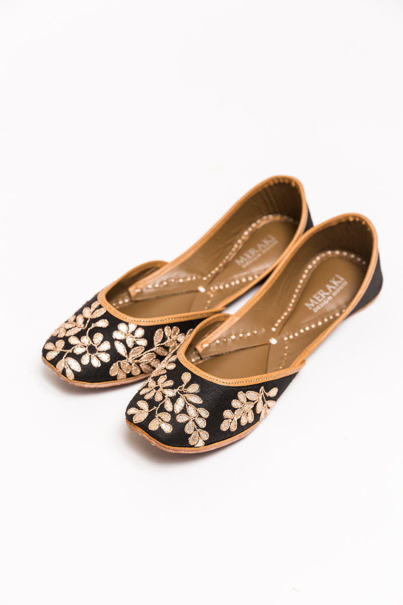 Handcrafted black flats, inspired by South Asian Khussa/Jutti design. Made with 100% genuine leather. Comfortable fancy flats perfect for any occasion. A classic black flat, with golden gota that goes perfectly with every outfit in your wardrobe.  