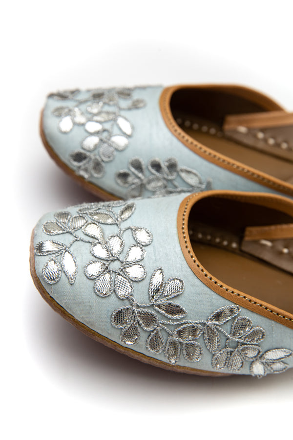 Handcrafted light blue flats, inspired by South Asian Khussa/Jutti design. Made with 100% genuine leather. Comfortable fancy flats perfect for any occasion. A classic flat designed with gota that goes perfectly with every outfit in your wardrobe.