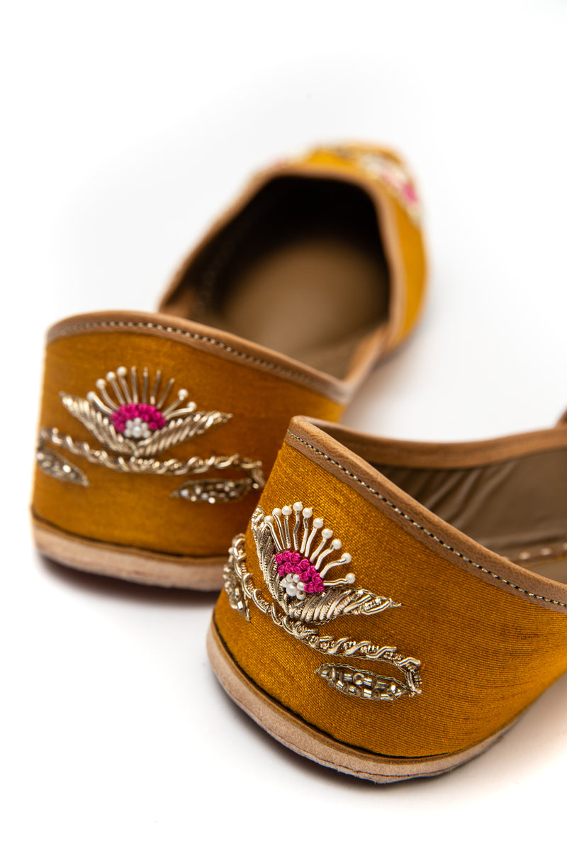 Handcrafted yellow flats, inspired by South Asian Khussa/Jutti design. Made with 100% genuine leather. Comfortable fancy flats perfect for any occasion, especially for a daytime wedding. Pink embroidery, made for a mehndi function. 