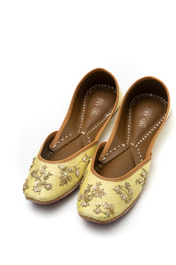 Handcrafted lemon flats, inspired by the traditional form of South Asian Khussa/Jutti. Made with 100% genuine leather to keep you comfortable regardless of the occasion.