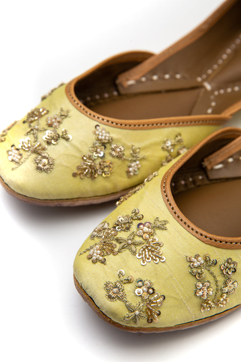 Handcrafted lemon flats, inspired by the traditional form of South Asian Khussa/Jutti. Made with 100% genuine leather to keep you comfortable regardless of the occasion.