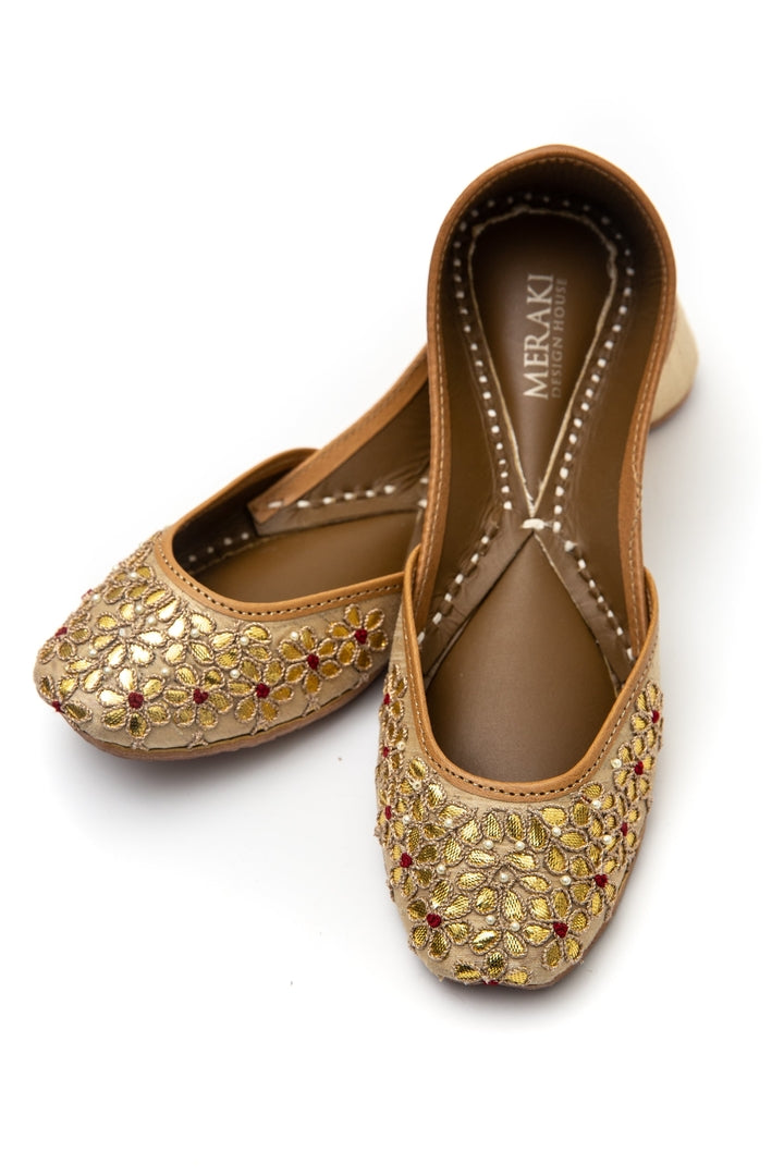 Handcrafted golden flats, inspired by South Asian Khussa/Jutti design. Made with 100% genuine leather. Comfortable and fancy flats perfect for a night out or a wedding. Must have shoes. 