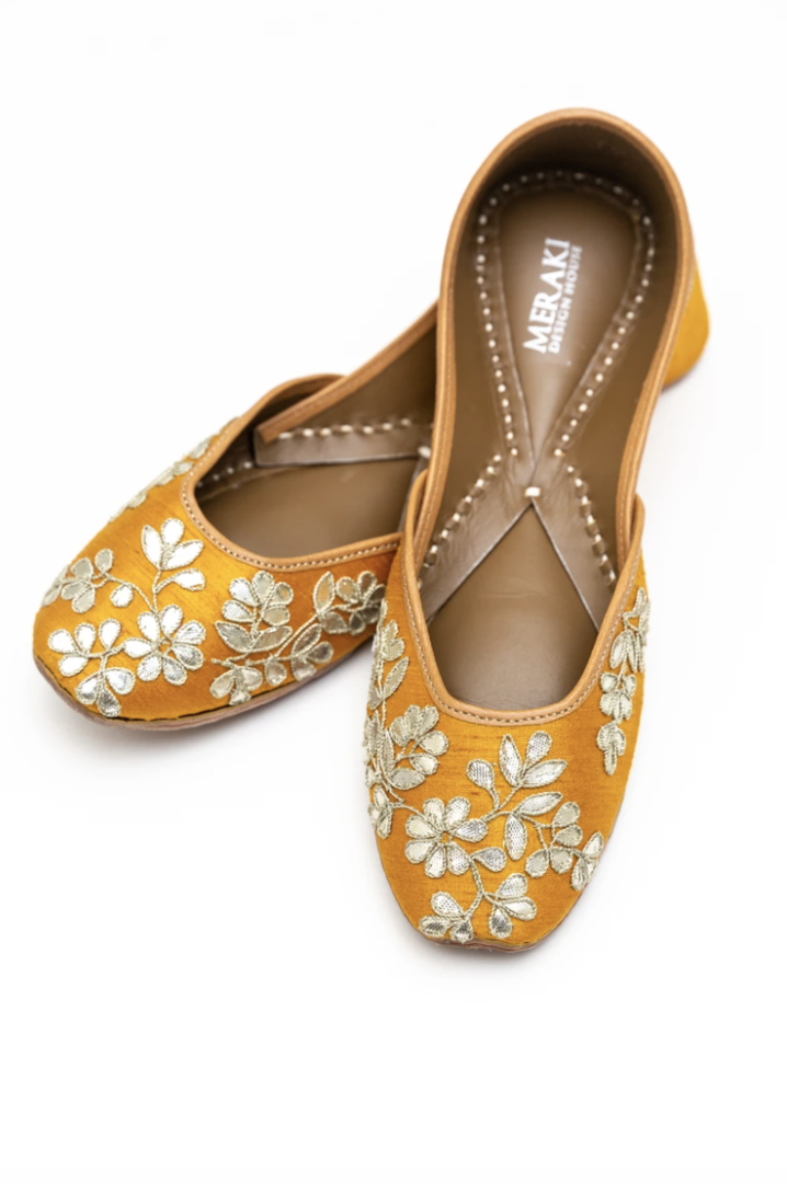 Handcrafted yellow flats, inspired by South Asian Khussa/Jutti design. Made with 100% genuine leather. Intricate embroidery and comfort come together to bring the most perfect flats for any occasion, especially summer dates and weddings. 