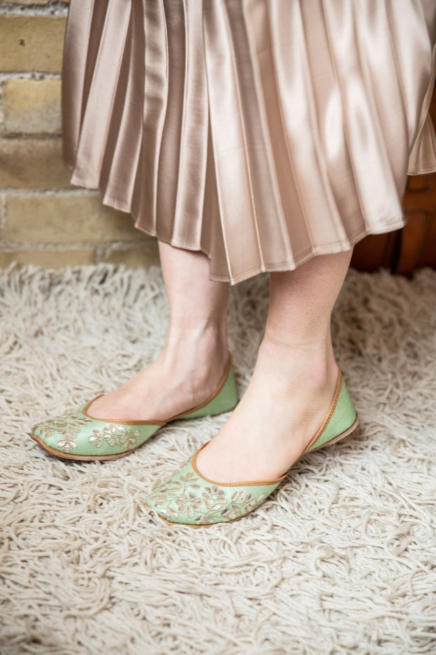 Handcrafted pale green flats, inspired by South Asian Khussa/Jutti design. Made with 100% genuine leather. Intricate gota embroidery and comfort come together to bring the most perfect flats for any occasion. 