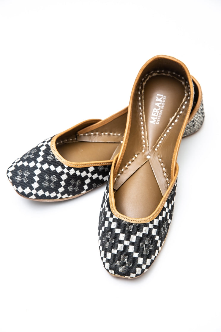 Handcrafted monochrome flats, inspired by the traditional form of South Asian Khussa/Jutti. Made with 100% genuine leather to keep you comfortable regardless of the occasion.