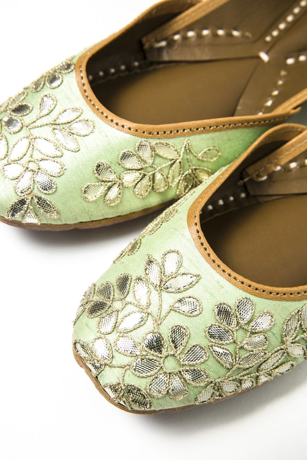 Handcrafted pale green flats, inspired by South Asian Khussa/Jutti design. Made with 100% genuine leather. Intricate gota embroidery and comfort come together to bring the most perfect flats for any occasion. 